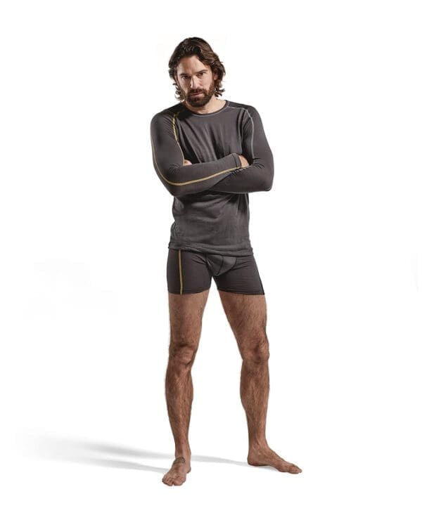 Undirtroyggja v/ langum ermum, merinoull, myrkagrá/gul